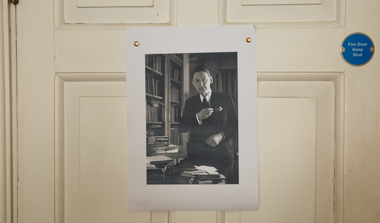 Picture of TS Eliot pinned to the back of a door