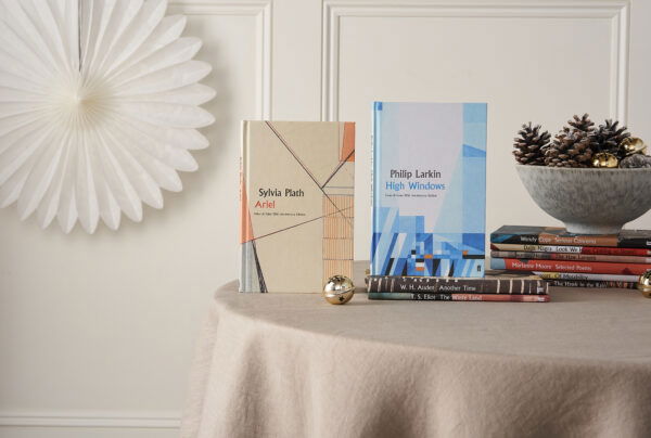Faber poetry editions standing on a decorated table Faber poetry editions standing on a decorated table