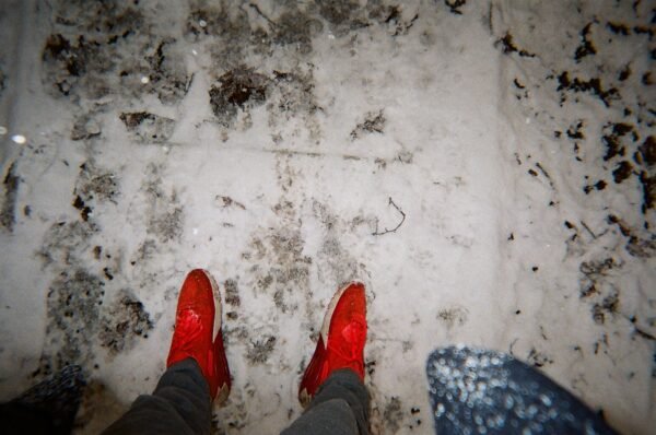 Red trainers on snow