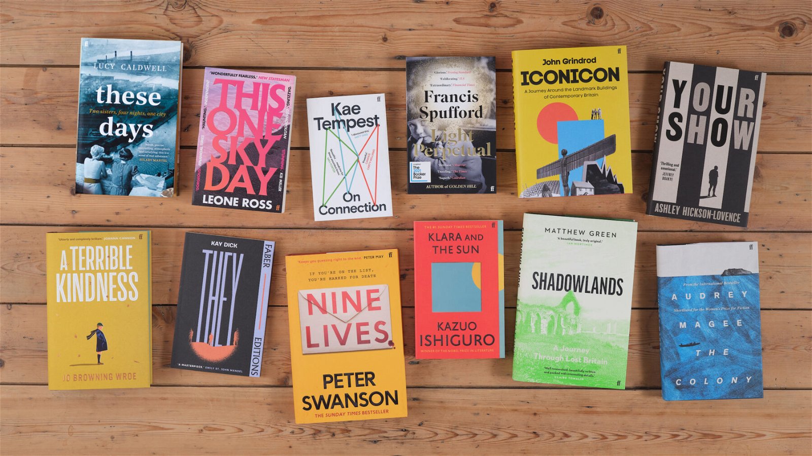 Faber spring 2022 titles on a wooden table