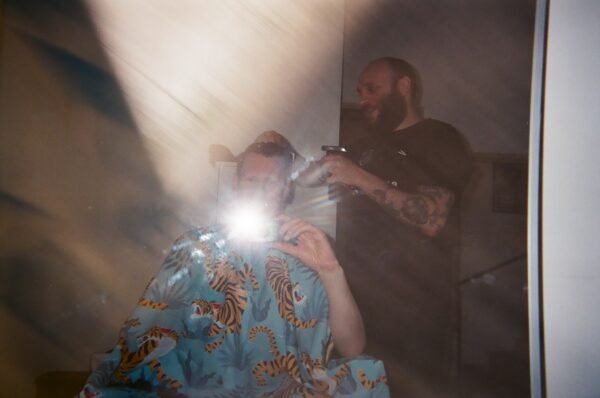 Chris Power getting a haircut