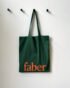 Faber autumn tote bag hanging on peg